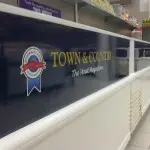 Cut vinyl and printed logo applied to freezers